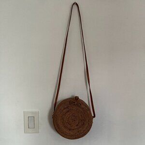 Tan handwoven rattan round bag